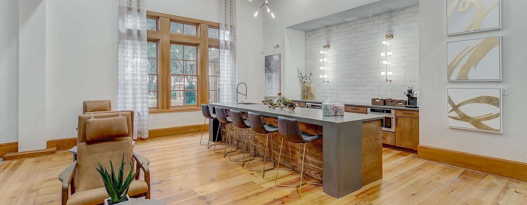 a large kitchen with a large island