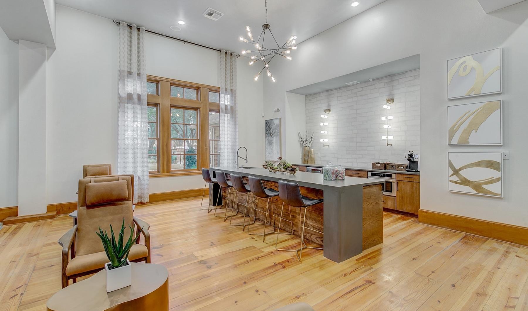 a large kitchen with a large island