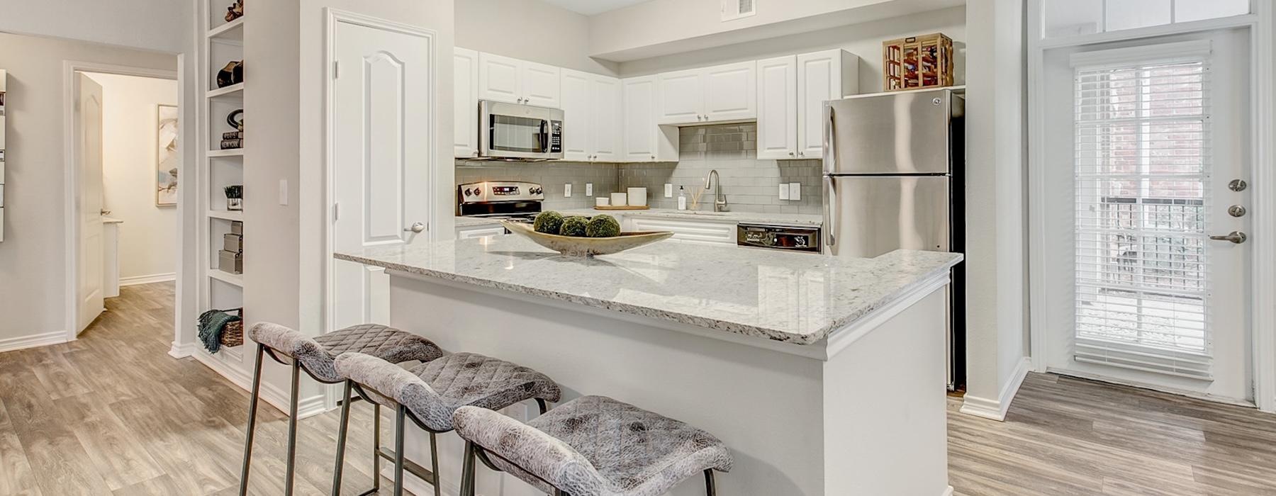 Well-lit kitchen with ample counter space